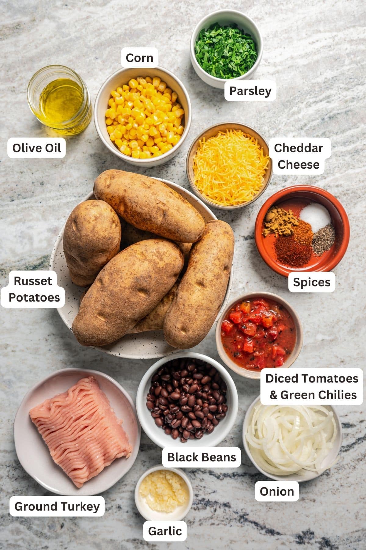 Ingredients for loaded baked potatoes. 