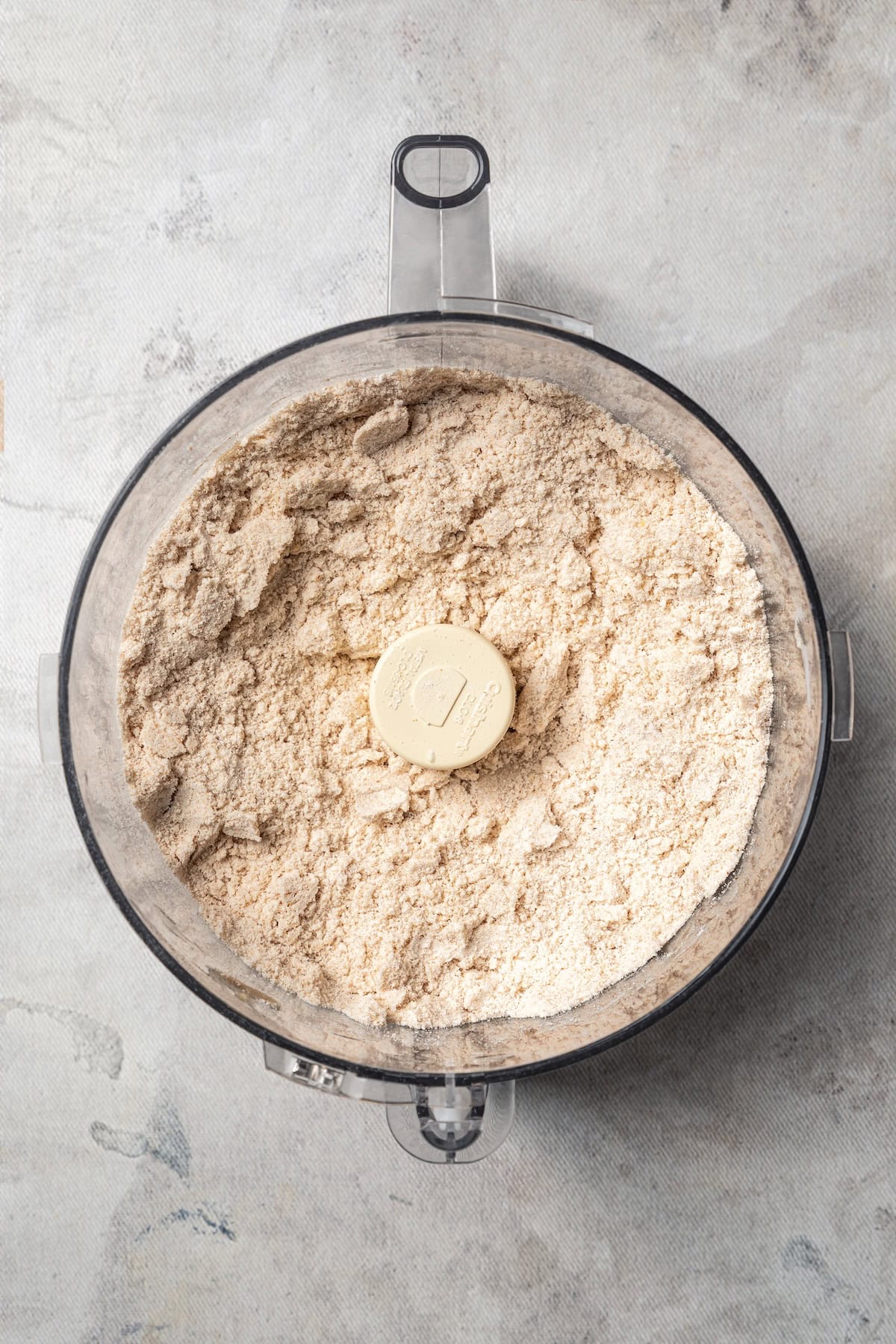 Cookie crust blended inside a food processor.