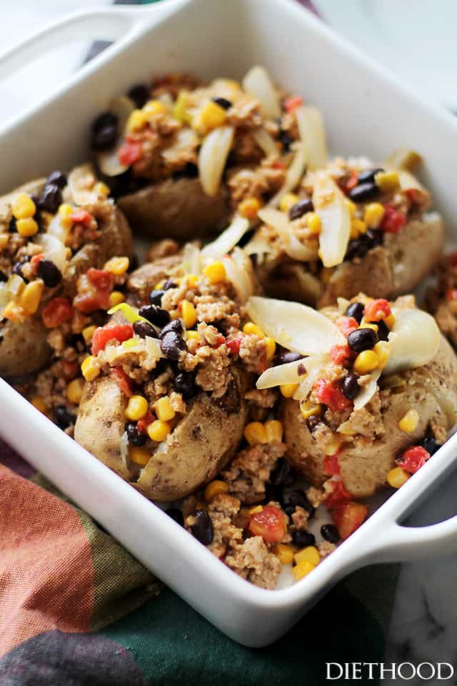 Southwestern Loaded Baked Potatoes | www.diethood.com | Crispy oven baked potatoes loaded with ground turkey, black beans, corn, tomatoes and cheese.
