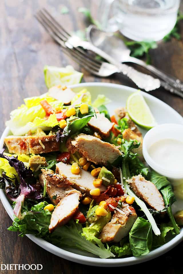 Grilled Chipotle Chicken Salad - Oven grilled chicken seasoned with chipotle powder and tossed with all your favorite southwestern fixings. An incredibly delicious salad with a bite! Get the recipe on diethood.com