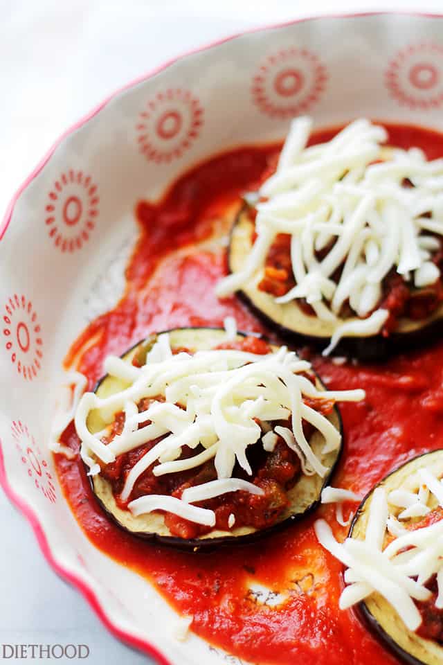Roasted Eggplant and Tomato Sauce Stacks - A delicious combination of sweet, roasted eggplants topped with a perfectly textured tomato sauce and gooey mozzarella cheese! Get the recipe on diethood.com