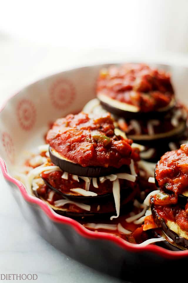 Roasted Eggplant and Tomato Sauce Stacks - A delicious combination of sweet, roasted eggplants topped with a perfectly textured tomato sauce and gooey mozzarella cheese! Get the recipe on diethood.com
