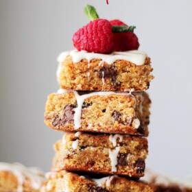Flourless Chocolate Peanut Butter Blondies - Lightened-up, thick, chewy bars loaded with chocolate chips and peanut butter. They are also 120 calories per serving! It doesn't get any better than that! Get the recipe on diethood.com