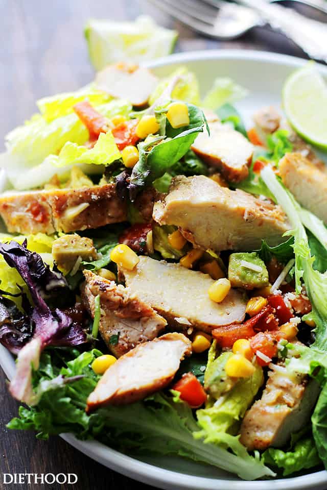 Grilled Chipotle Chicken Salad - Oven grilled chicken seasoned with chipotle powder and tossed with all your favorite southwestern fixings. An incredibly delicious salad with a bite! Get the recipe on diethood.com