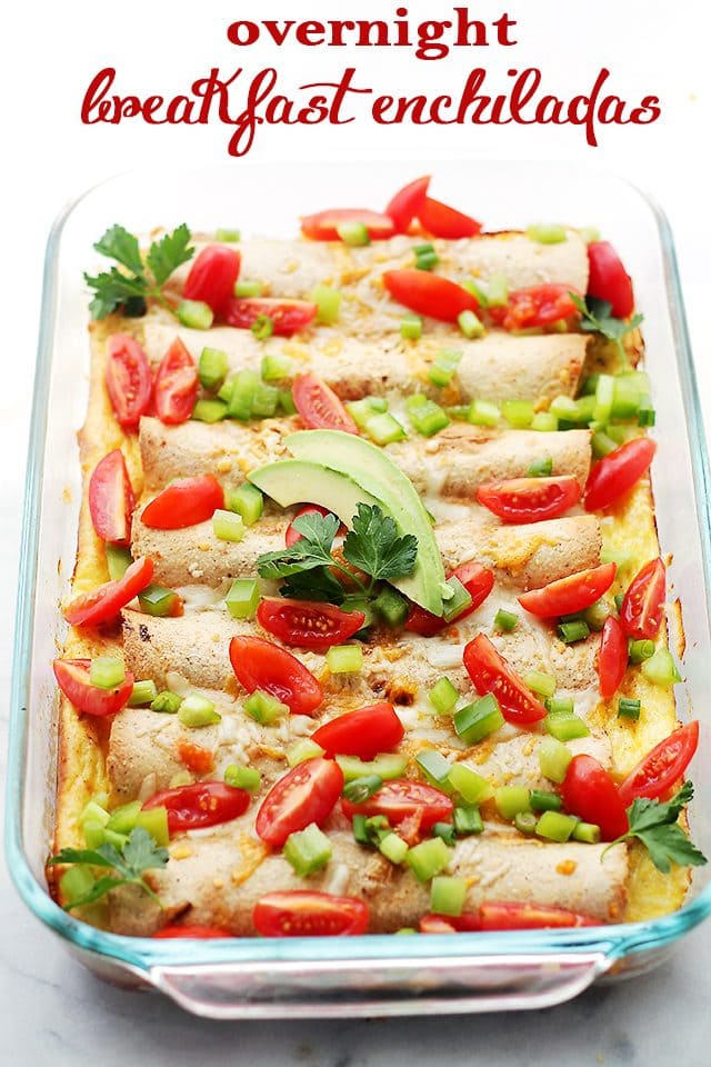 Overnight Breakfast Enchiladas - Flour Tortillas filled with turkey sausage, green onions, peppers and cheese, covered in a creamy egg batter and baked. A delicious breakfast casserole that can be prepped the night before and baked the next day! Get the recipe on diethood.com