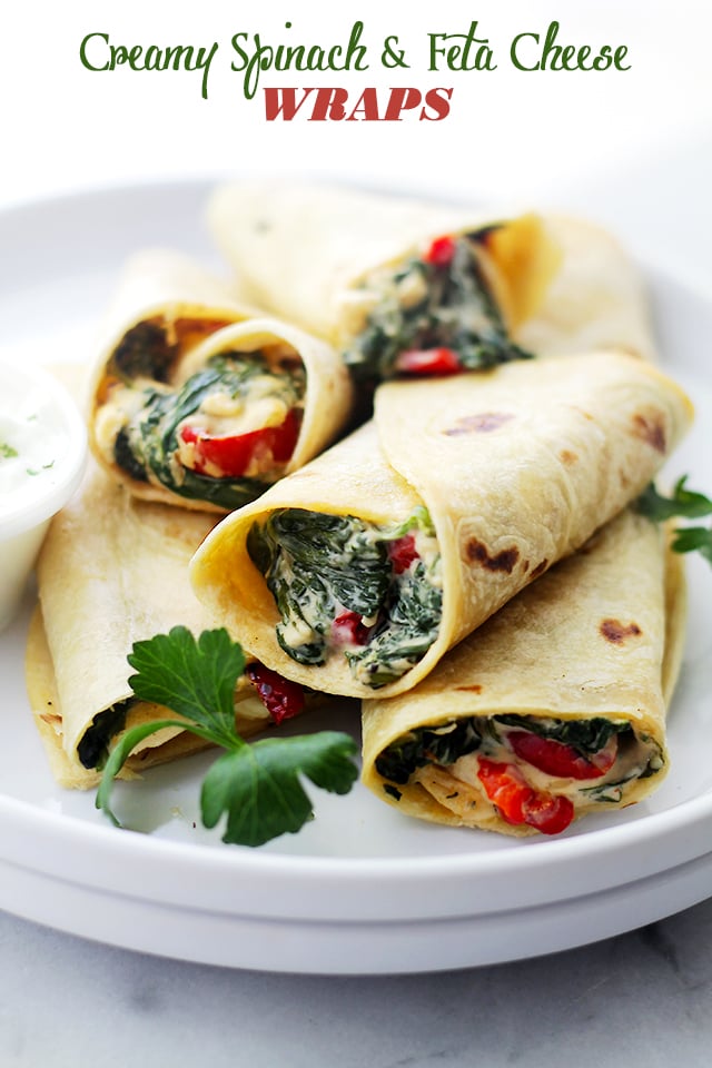 Creamy Spinach and Feta Cheese Tortilla Wraps - A deliciously creamy mixture of cheeses, peppers, spinach and feta wrapped in a flour tortilla. Get the recipe on diethood.com