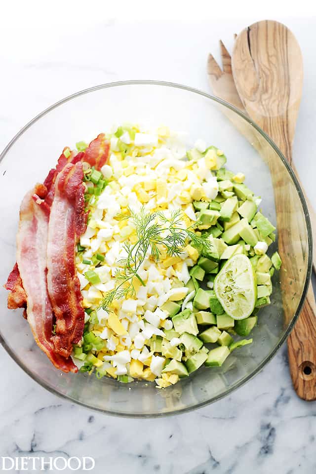 Avocado Egg Salad - Mayo-free, chunky and delicious egg salad with avocados, crunchy bacon, green onions, dill, lime juice and yogurt. Get the recipe on diethood.com