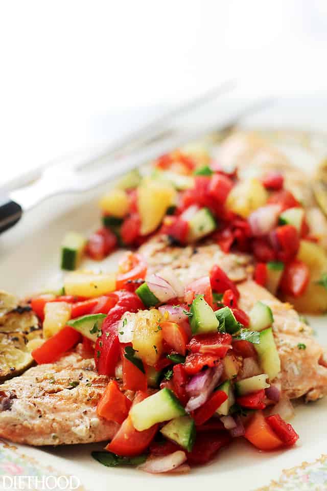 Grilled Salmon with Pineapple & Piquillo Peppers Salsa - A quick, fresh and extremely flavorful Pineapple & Piquillo Peppers Salsa served alongside grilled Salmon. Get the recipe on diethood.com