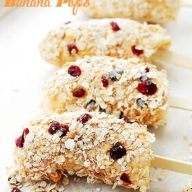 Yogurt Granola Banana Pops - Frozen bananas dipped in fruit-yogurt and covered in granola. One of the best snacks, evah! AND, you might even believe that you're eating ice cream! Get the recipe on diethood.com