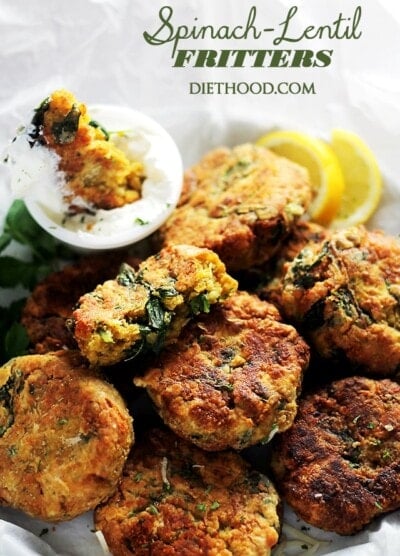 Spinach Lentil Fritters - Deliciously crispy fritters made with lentils and spinach, and served with a side of lemon-sour cream sauce.