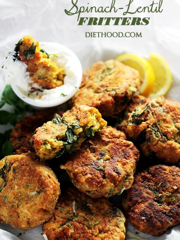 Spinach Lentil Fritters - Deliciously crispy fritters made with lentils and spinach, and served with a side of lemon-sour cream sauce.