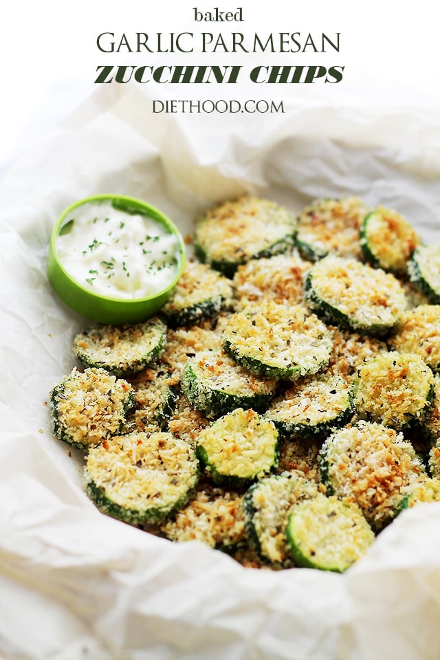 Garlic Parmesan Baked Zucchini Chips arranged in a bowl lined with paper and a smaller bowl filled with Taratur sauce.