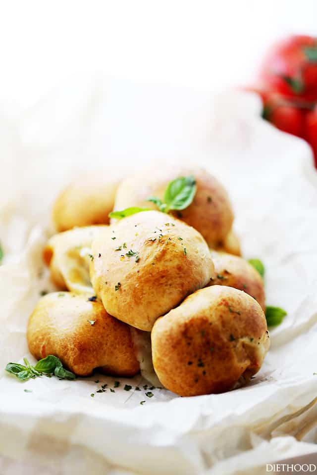 Caprese Cheese Bombs | www.diethood.com | Soft and flavorful ready-to-bake biscuits filled with a delicious Caprese mixture of sliced tomatoes, shredded mozzarella, and fresh basil.