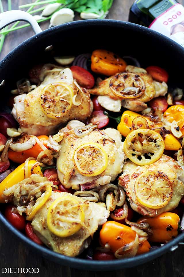 One Pot Lemon-Garlic Chicken and Veggies | www.diethood.com | Tender, garlicky, seared chicken thighs baked with sweet peppers, onions and tomatoes.