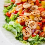 Close-up of mango and grilled shrimp salad