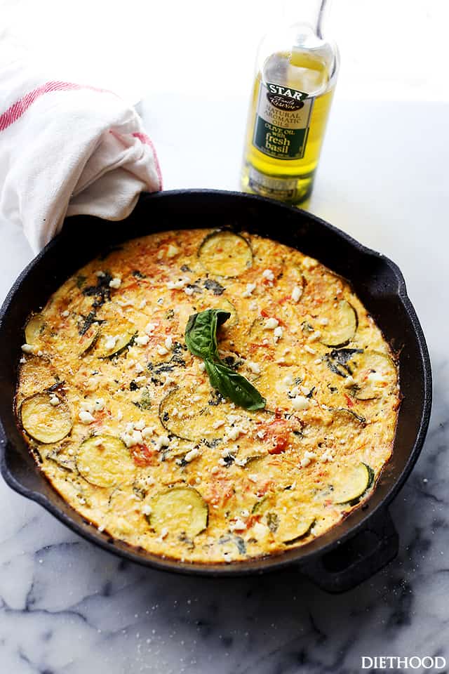 Tomato and Zucchini Frittata | www.diethood.com | Loaded with tomatoes, zucchini, basil and feta cheese, this easy frittata recipe fuses a range of flavors making it the perfect dish for breakfast, brunch, or even dinner.