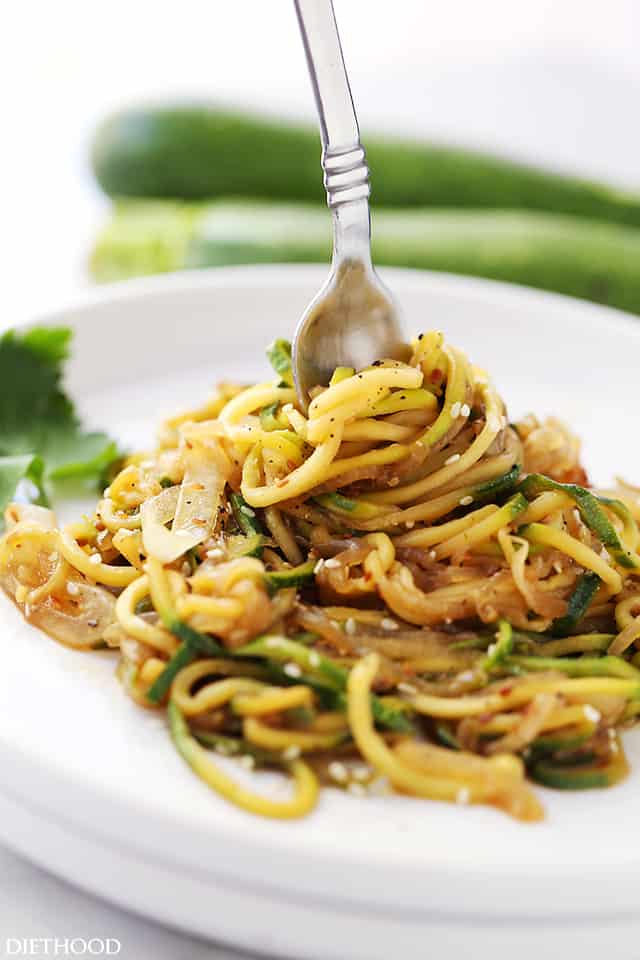 Stir Fry Zucchini Noodles | www.diethood.com | Delicious, low-carb, healthy Stir Fry made with spiralized zucchini and onions tossed with teriyaki sauce and toasted sesame seeds.