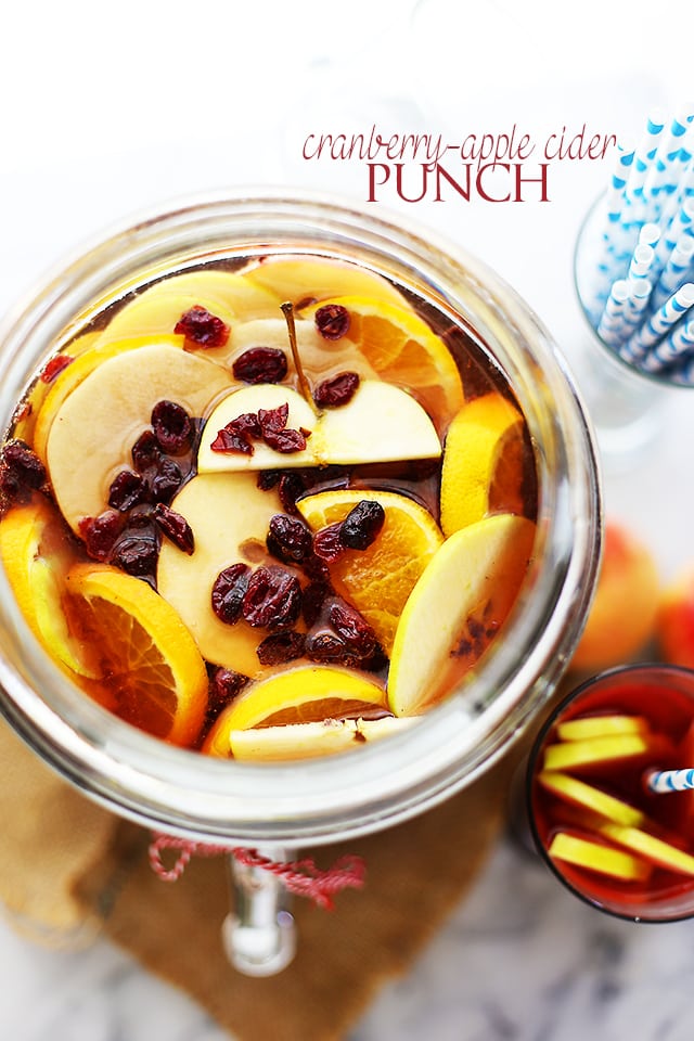 Cranberry Apple Cider Punch in a glass pitcher.