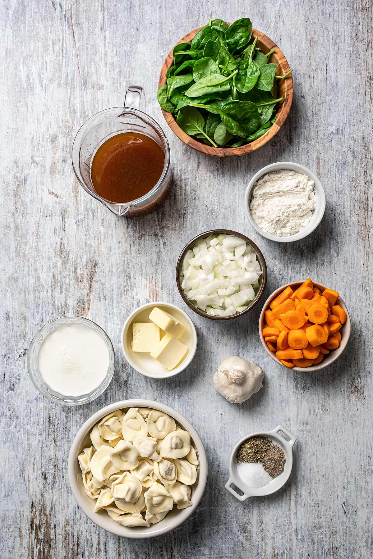 The ingredients for creamy tortellini soup.