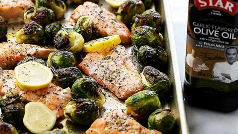 One Sheet Pan Garlic Roasted Salmon with Brussels Sprouts | www.diethood.com | Incredibly delicious, garlicky, super flavorful one-pan dinner with oven-roasted salmon and brussels sprouts.