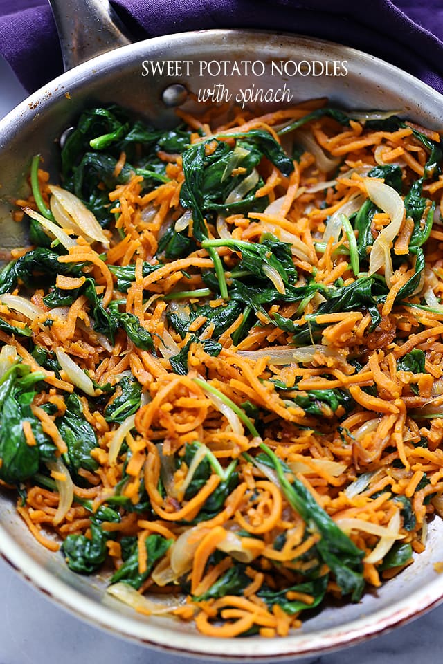 Sweet Potato Noodles with Spinach | www.diethood.com | Delicious, adaptable, vegetarian recipe with garlicky sweet potato noodles, spinach, onions, and a sprinkle of cheese.