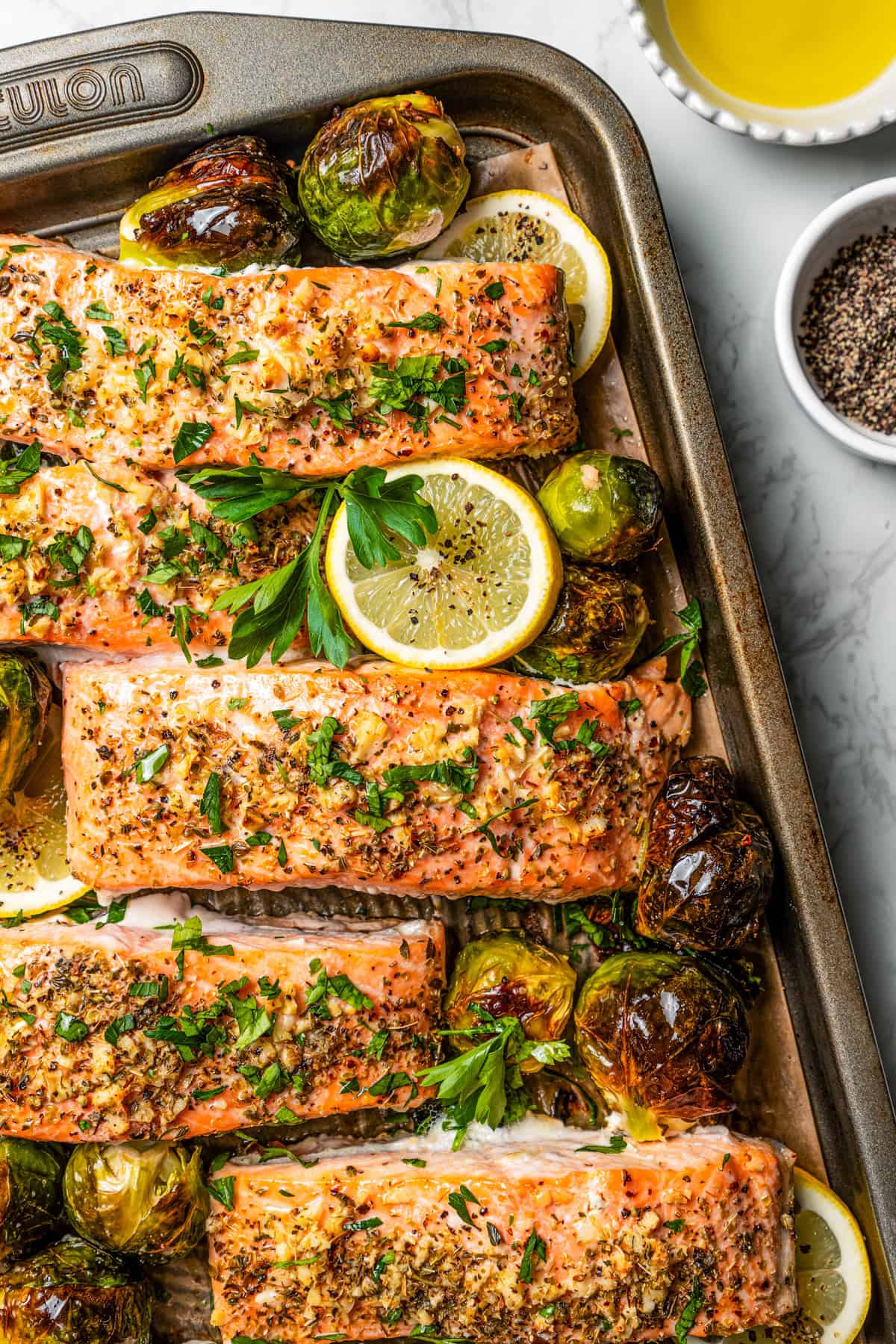 Close-up overhead view of sheet pan salmon.