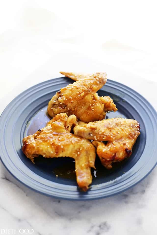 Crock Pot Honey Mustard Chicken Wings | www.diethood.com | The classic, delicious sweet-tangy duo of honey and mustard combined with chicken wings and prepared in the crock pot. Delicious doesn't even begin to describe this amazingness!