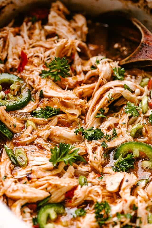 shredded chicken garnished with parsley