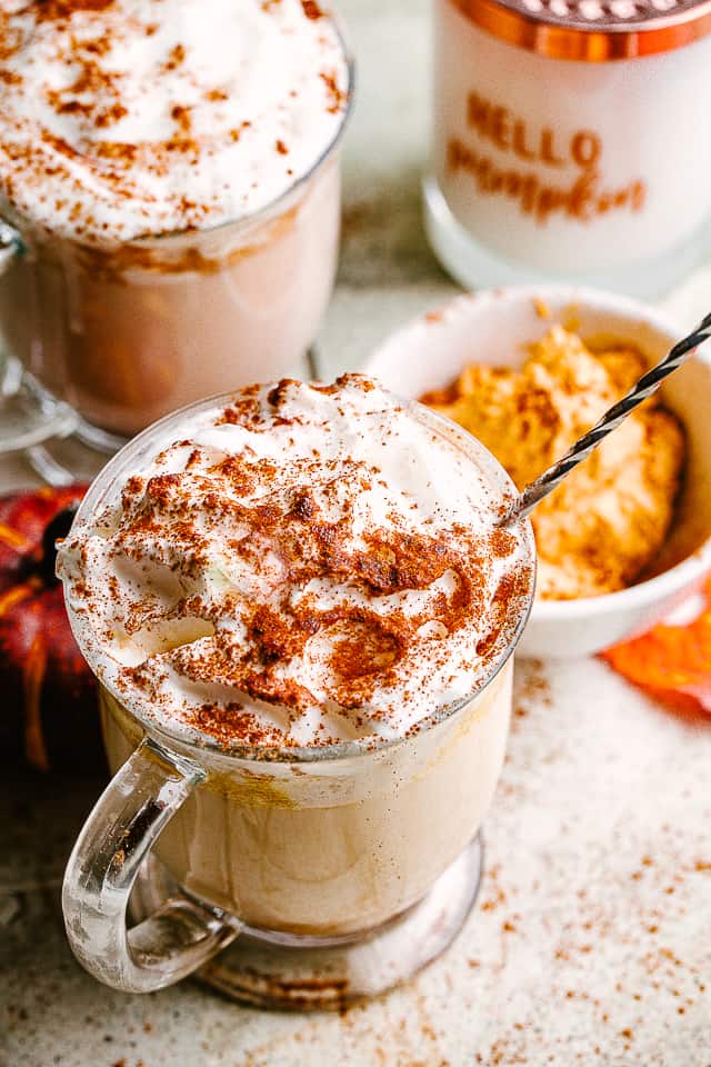 Pumpkin Spice Latte topped with whipped cream and pumpkin pie spice.