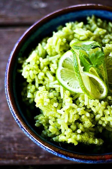 Scallion Cilantro Lime Rice in a bowl topped with lime slice