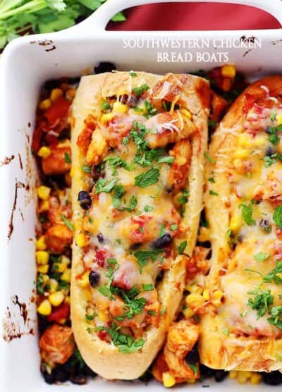 Southwestern Chicken Bread Boats - Stuffed french bread with a hearty, warm and delicious chicken-mixture with tomatoes, black beans, and corn.