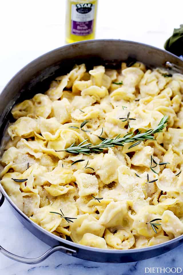 Rosemary Garlic Tortellini Alfredo - Easy, creamy, garlicky, 30-minute dinner with cheese tortellini and a lightened-up, homemade, flavorful Alfredo sauce.
