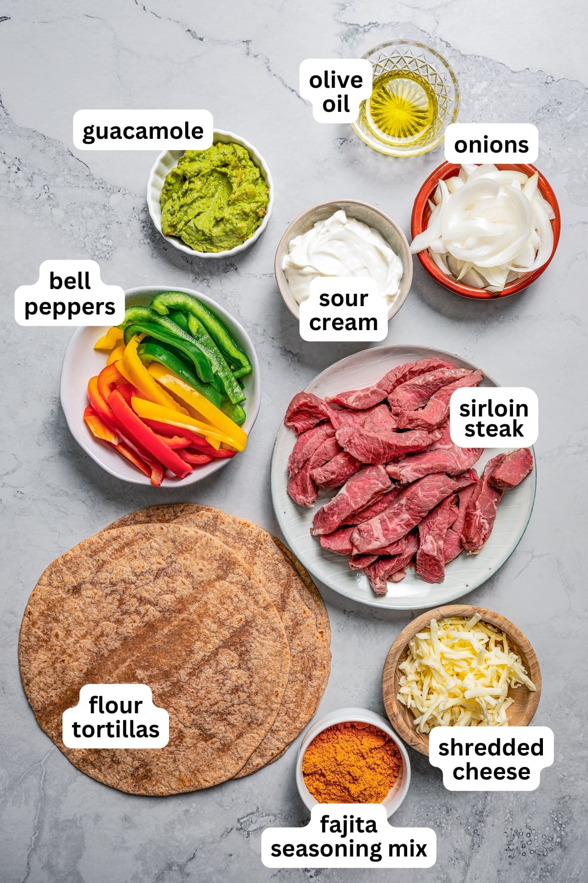 Overhead image of all the ingredients used to make steak fajitas.