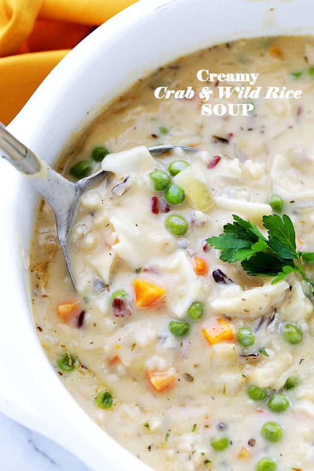 Creamy Crab and Wild Rice Soup in white soup pot