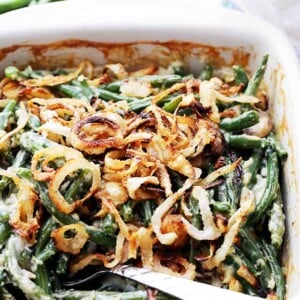 Lightened-Up Creamy Green Bean Casserole - A delicious and creamy lightened-up version of everyone's favorite Thanksgiving green beans side dish made with fresh ingredients, and without the canned processed creams.