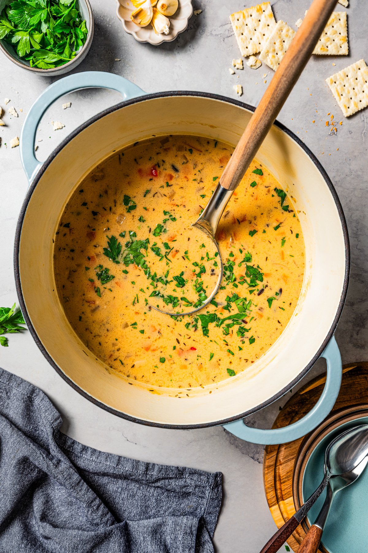 Soup in a large pot with a ladle.