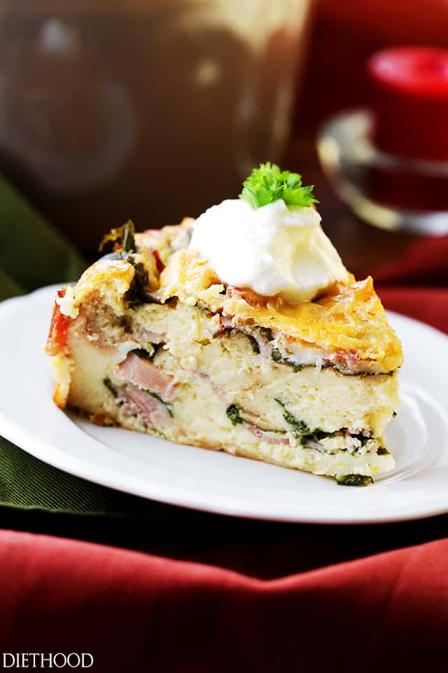 Make Ahead Breakfast Casserole - Easy to prepare, make ahead breakfast casserole chock full of hearty bacon, ham, cheeses and spinach. Prepare this the night before and just pop it in the oven in the morning. Warm, cheesy and delicious!
