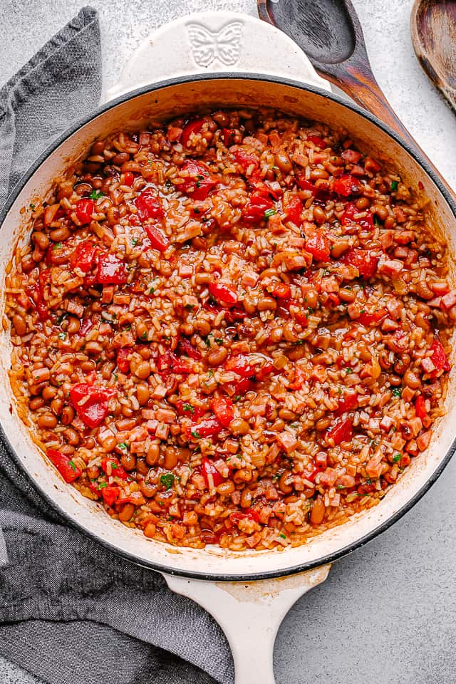 Overhead view of rice and black eyed peas in a skillet