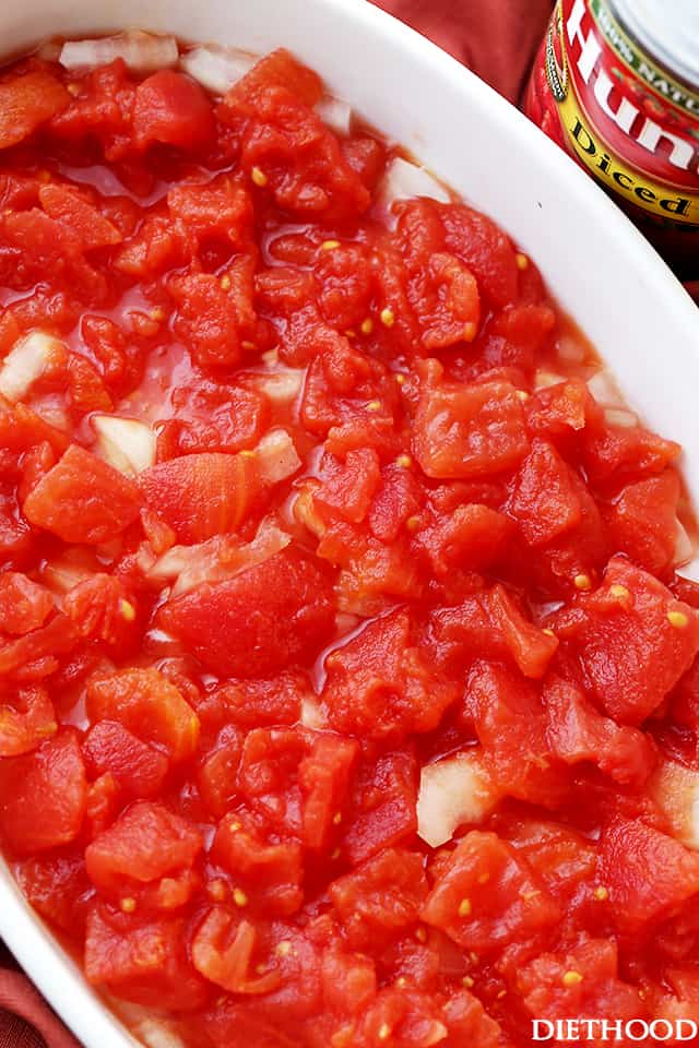 Diced tomatoes in a white dish.