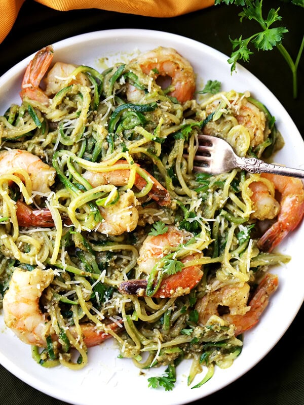 Pesto Zucchini Noodles and Shrimp - Quick and easy dinner recipe with tender zucchini noodles and perfectly sauteed shrimp tossed in a delicious basil pesto sauce.