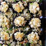 Crab Stuffed Mushrooms - Packed with crab meat and drizzled with garlic butter sauce, these delicious stuffed mushrooms are so easy to prepare, and they make for the perfect appetizer!