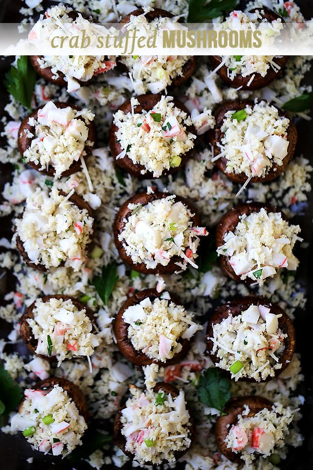 Crab Stuffed Mushrooms - Packed with crab meat and drizzled with garlic butter sauce, these delicious stuffed mushrooms are so easy to prepare, and they make for the perfect appetizer!