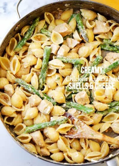 Creamy Chicken Asparagus Shells and Cheese Recipe - Lightened-up, yet perfectly creamy homemade shells and cheese made with chicken, asparagus, cream cheese and feta.