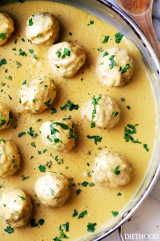 Creamy gravy in the pan with turkey meatballs. 