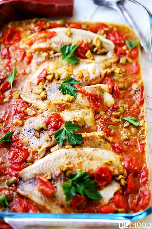 Mediterranean Style Baked Tilapia - A quick, easy, and healthy fish recipe with olives and tomatoes that's perfect for a weeknight dinner, and fancy enough for a dinner party! 