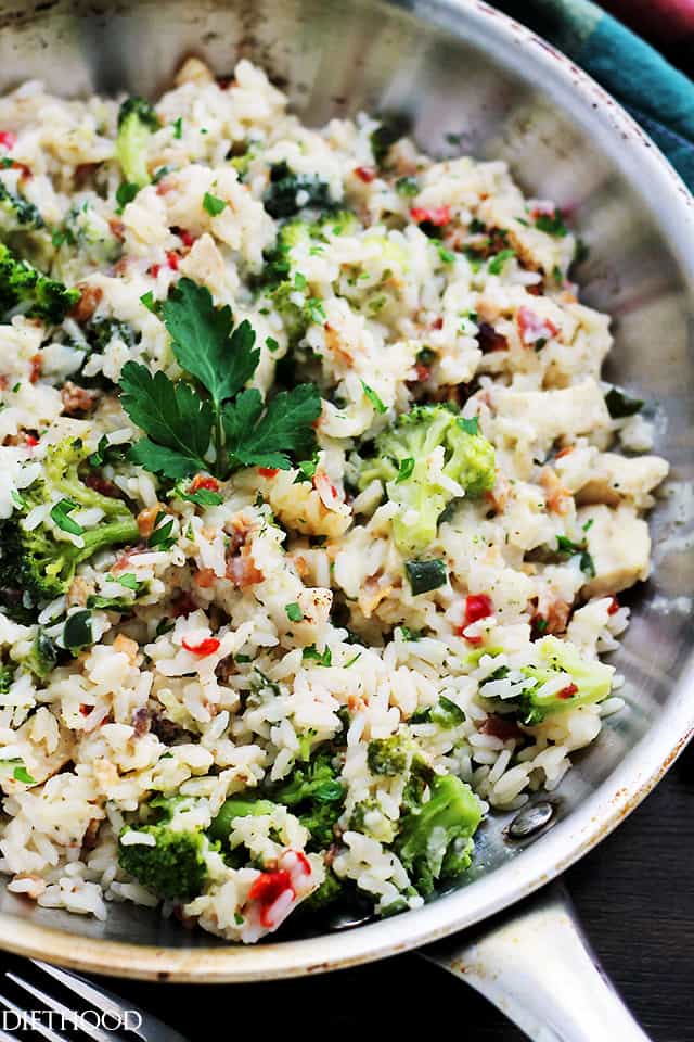 One Skillet Broccoli and Rice Ranch Chicken Recipe - An easy weeknight skillet dinner that is ready in under 30 minutes with ranch-mix seasoned chicken, broccoli and rice.