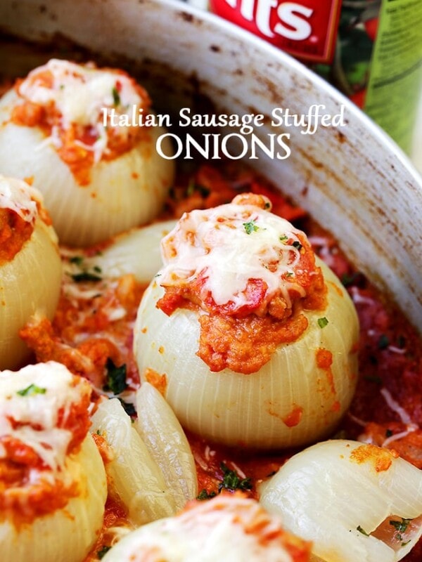 Italian Sausage Stuffed Onions - Filled with Italian sausage, tomatoes, and cheese, these Stuffed Onions are the perfect, most delicious side dish to any meal.