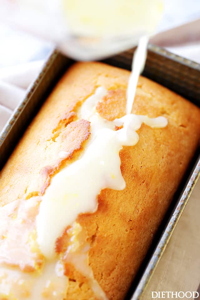 Lemon Bread Recipe - Packed with lemon flavor, this easy to make quick bread is sweet, crumbly, lightened-up, and incredibly flavorful! The Lemon Glaze takes it over the top!