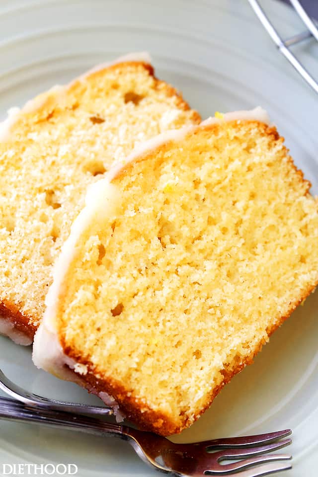 Lemon Bread Recipe - Packed with lemon flavor, this easy to make quick bread is sweet, crumbly, lightened-up, and incredibly flavorful! The Lemon Glaze takes it over the top!