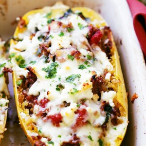 Mediterranean Spaghetti Squash Boats - Low carb, healthy, easy to make Spaghetti Squash boats loaded with ground turkey, tomatoes, kale and feta cheese.